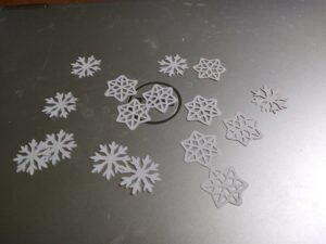 Paper cutouts of snowflakes