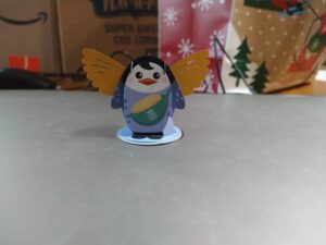 Another penguin with golden wings
