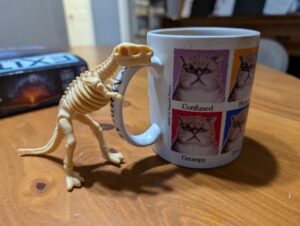 Dinosaur and a cup of coffee